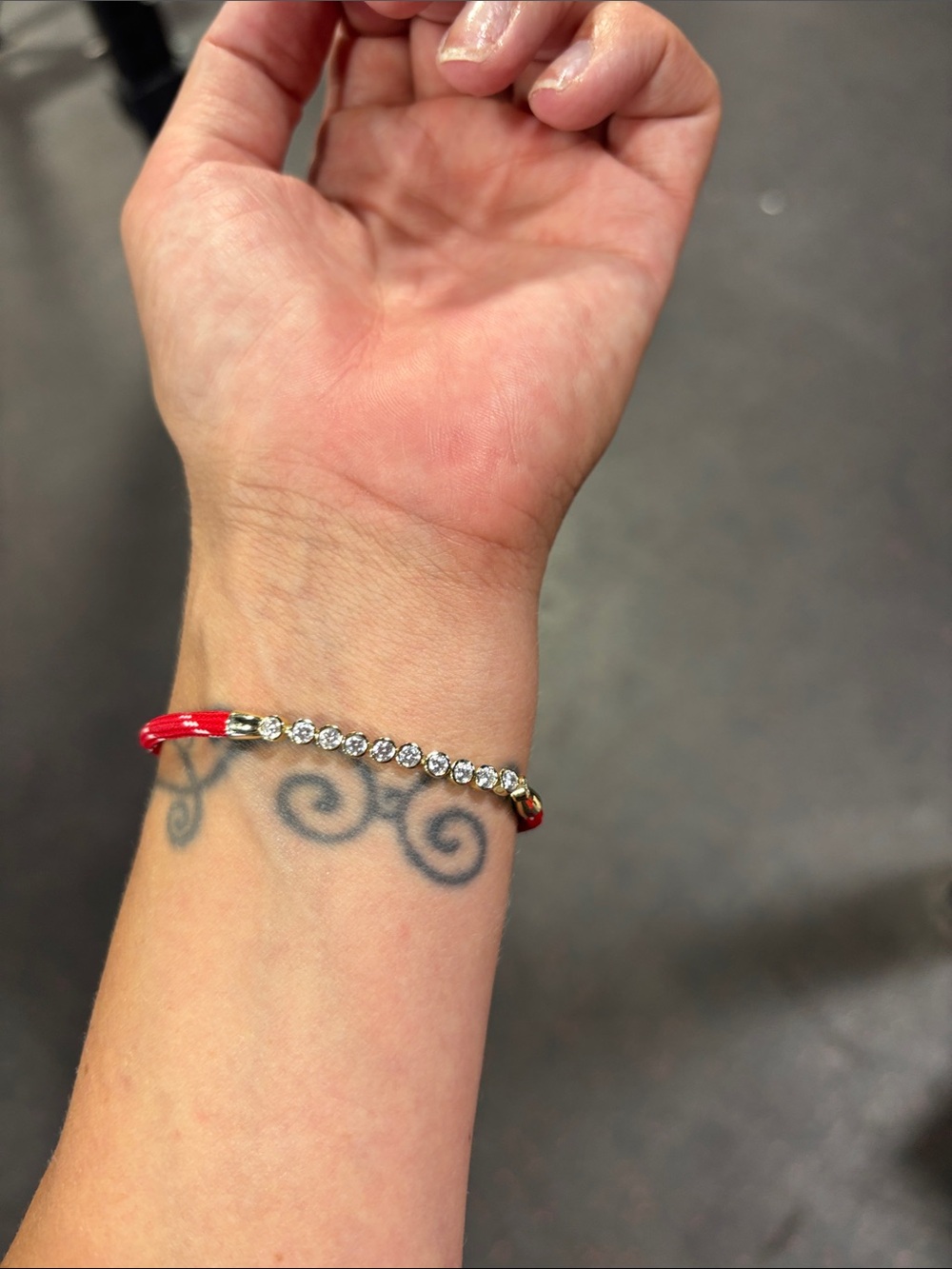 Red wrapped tennis gold bracelet from electric picks!